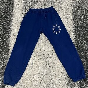 Adidas Blue Sweatpants with Starburst Design